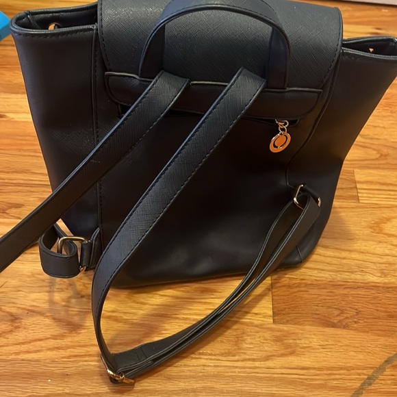 Stylish blue faux leather backpack with ample space for essentials! - Picture 3 of 6